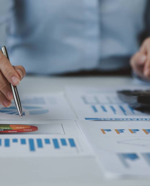 Businessman working at office with documents on his desk, doing planning analyzing the financial report, business plan investment, finance analysis concept